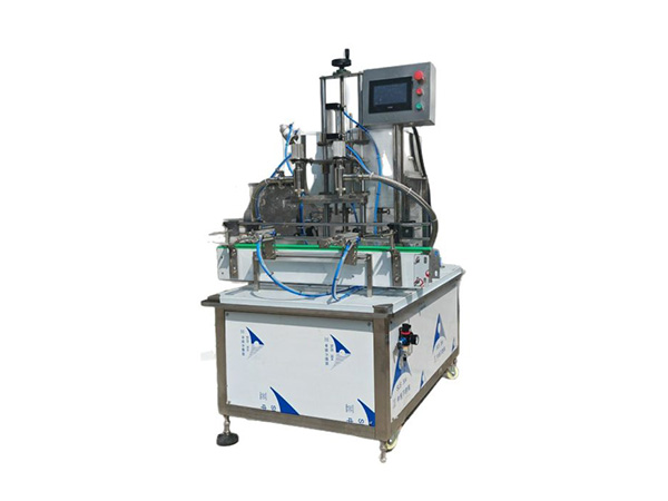 Semi-automatic double-head filling machine